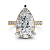 The Pear Bezel Accent Diamond Engagement Ring