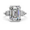 Emerald & Pear Three-Stone Setting