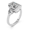 Emerald & Pear Three-Stone Setting