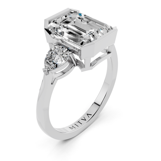 Emerald & Pear Three-Stone Setting